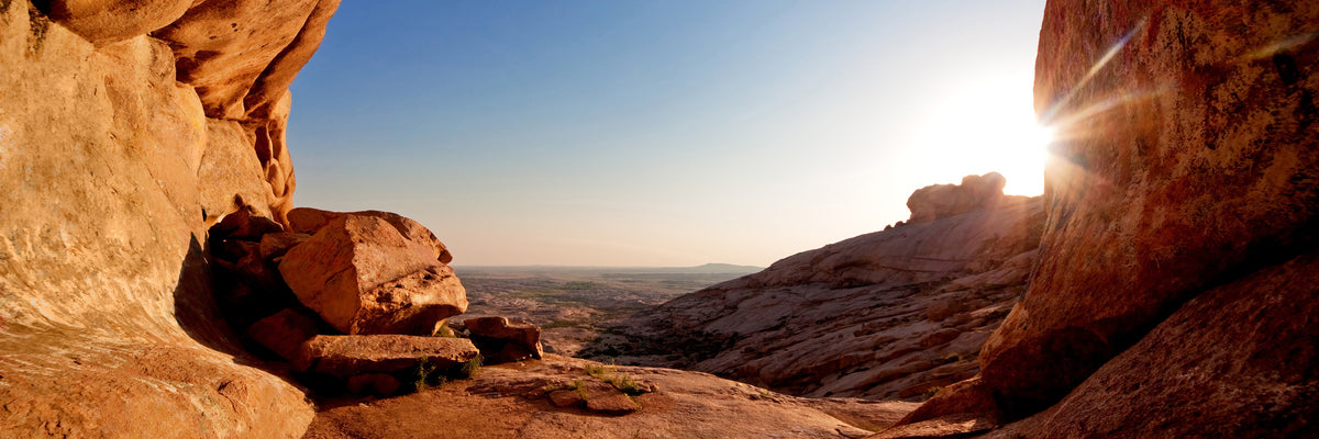 panoramic-canvas-print-sunset-in-front-of-the-cave-panorama