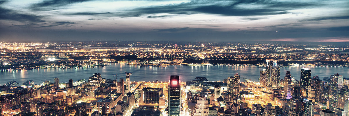 panoramic-canvas-print-skyline-manhattan-city-lights-panorama