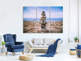 4-piece-canvas-print-stone-pile-on-the-beach